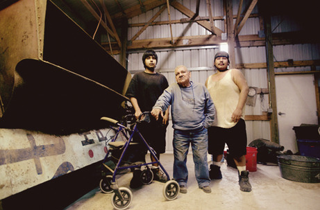  Subject: Dale and his grandsons in their processing plant gallery