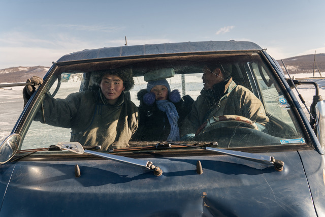  Spotlight Awards 2019 - Travel Photography Category Winning Image: A nomadic family in a pickup truck at Khövsgöl Lake in Northern Mongolia. gallery